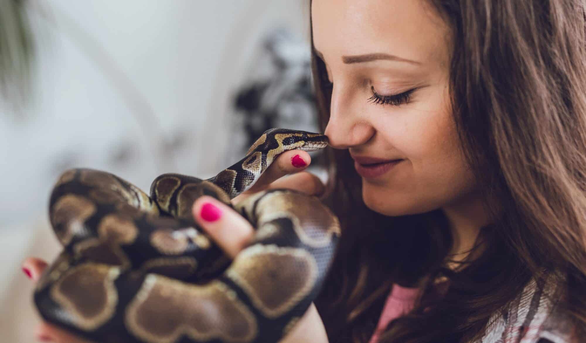 Woman with pet snake.